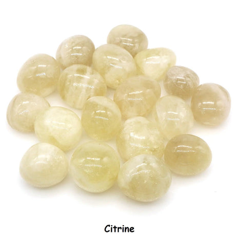 Citrine gemstones on a white background