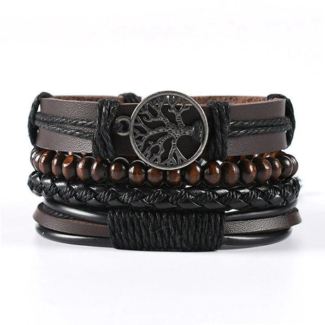 Multistrand leather and wood bracelet with tree of life charm on a white background