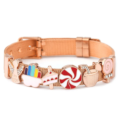 Rose gold bracelet with various charms on a white background