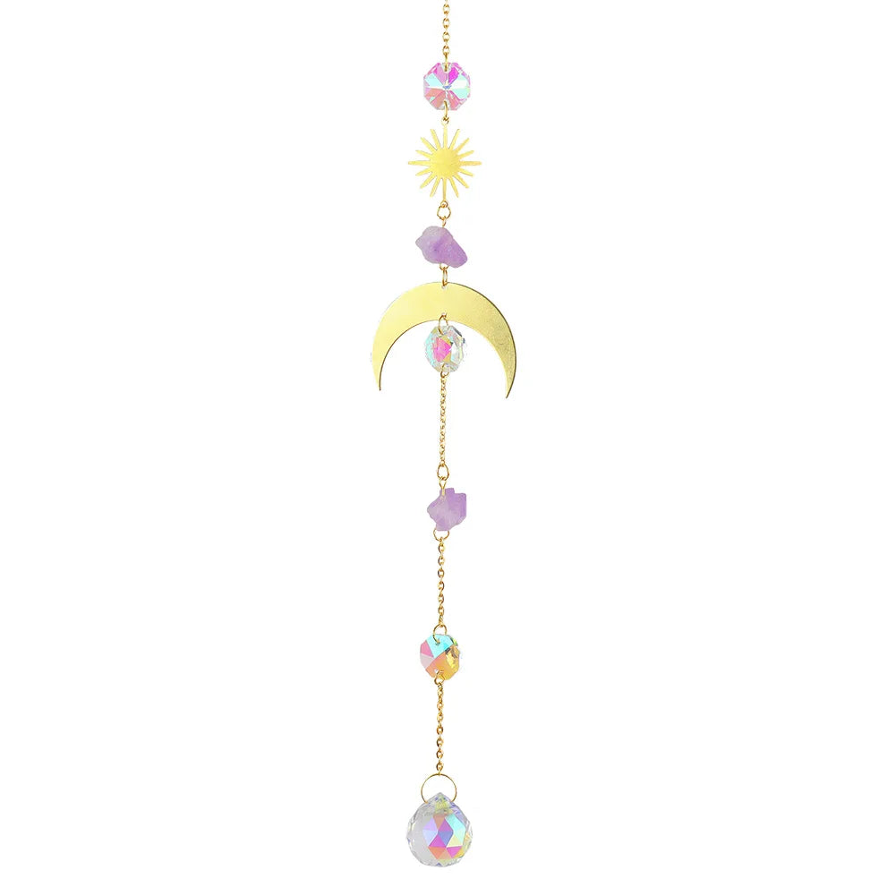 Decorative hanging ornament with sun, moon, and colorful beads on a white background