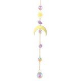 Decorative hanging ornament with sun, moon, and colorful beads on a white background