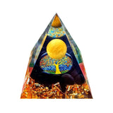 Triangular pyramid with colorful design and tree of life symbol on a white background