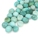 Turquoise beads on a white background