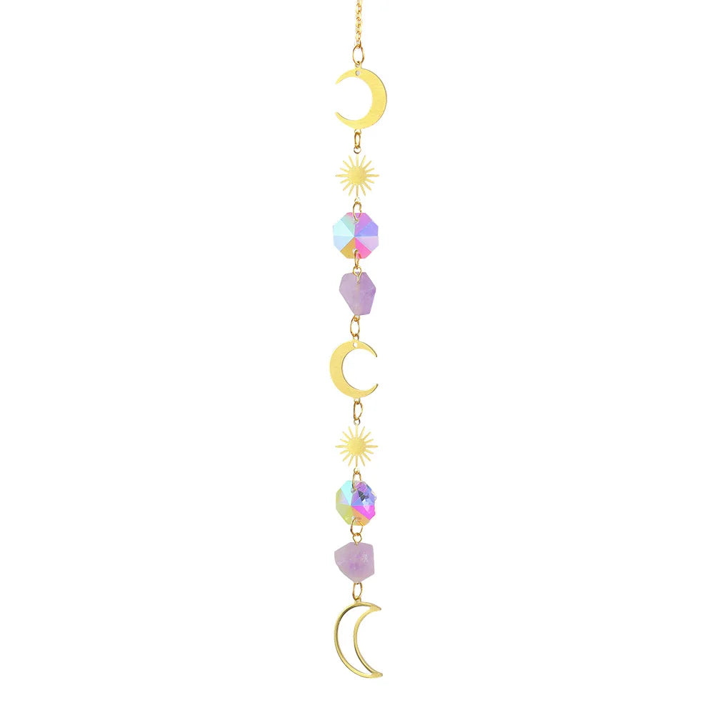 Decorative hanging chain with moon and sun shapes and colorful beads on a white background