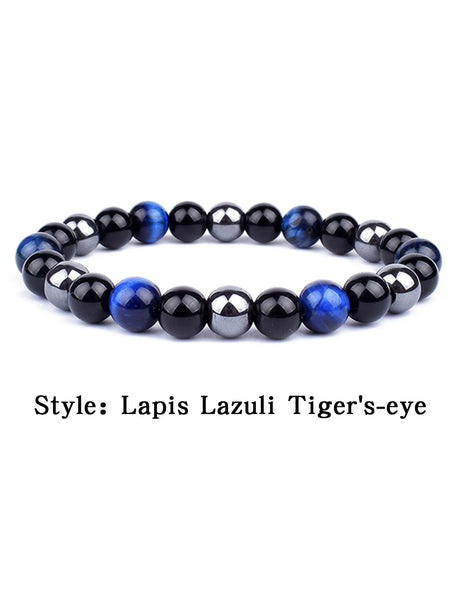 Lapis Lazuli and Tiger's-eye beaded bracelet on a white background