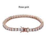 Rose gold bracelet with diamonds on a white background