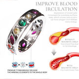 Jewelry ring with colored gemstones and an illustration of blood circulation benefits.