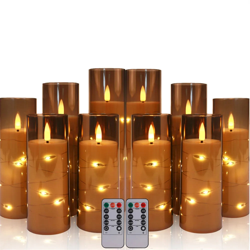 Set of LED candles with remote controls on a white background