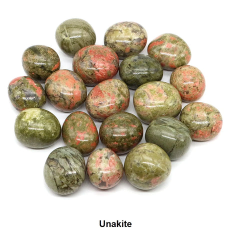 Unakite stones on a white background