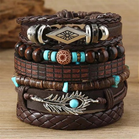 Stack of brown leather bracelets with metal and bead embellishments on a wooden surface.