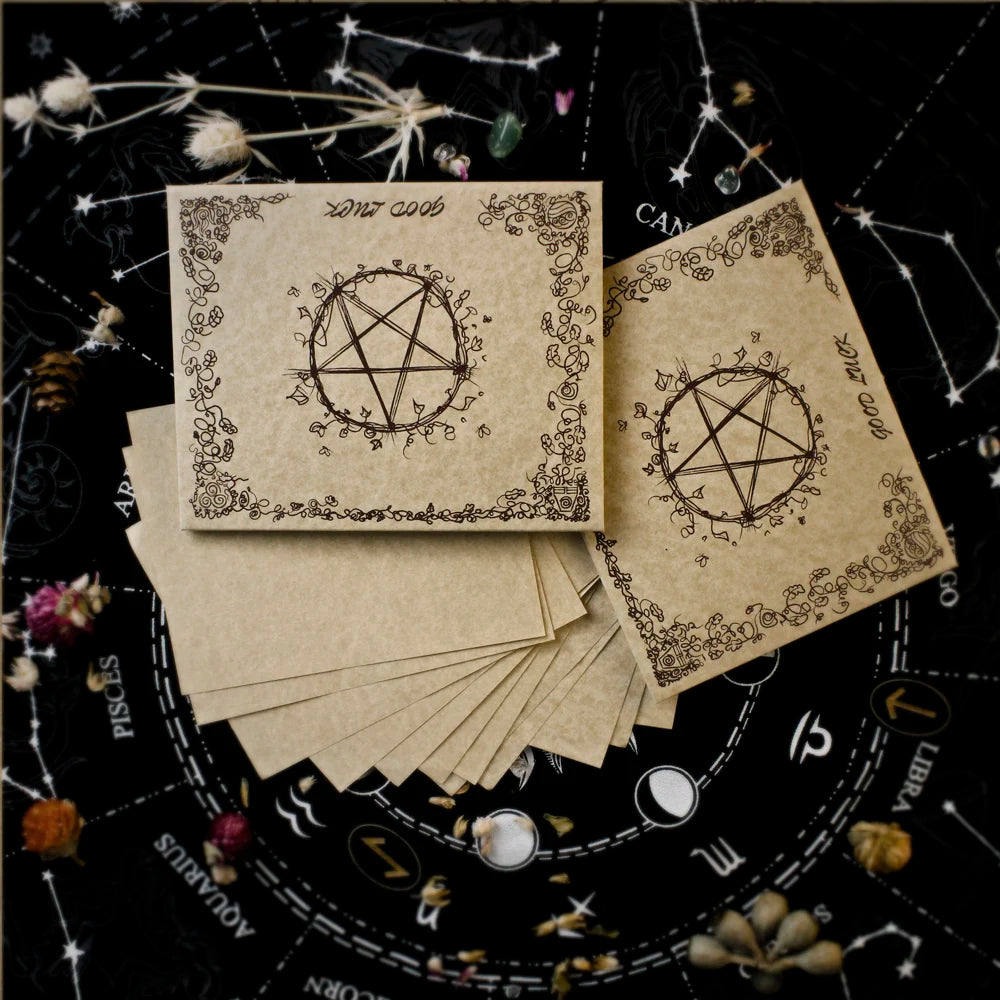 Set of cards with pentagram design on a astrological chart background