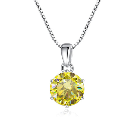 Yellow gemstone pendant on a silver chain against a white background