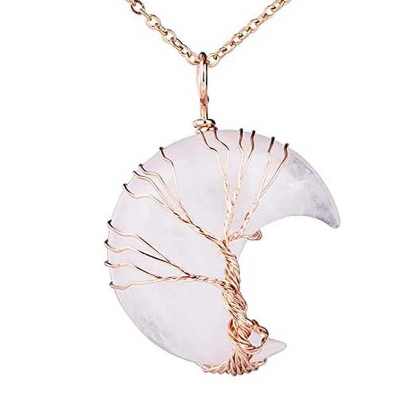 Necklace with a white crescent moon pendant and gold wire detailing on a white background