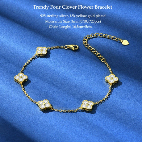 Gold bracelet with clover flowers on a blue background