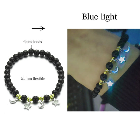 Black beaded bracelet with star and moon charms, labeled 'Blue light' on a white background.