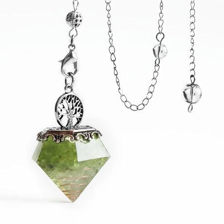 Necklace with a green crystal pendant on a white background