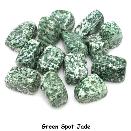 Green Spot Jade stones on a white background