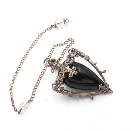 Necklace with black teardrop pendant and intricate design on a white background