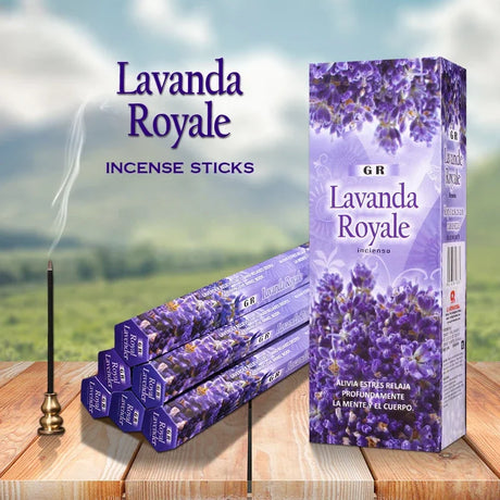 Lavanda Royale incense sticks with packaging on a wooden surface and blurred landscape background