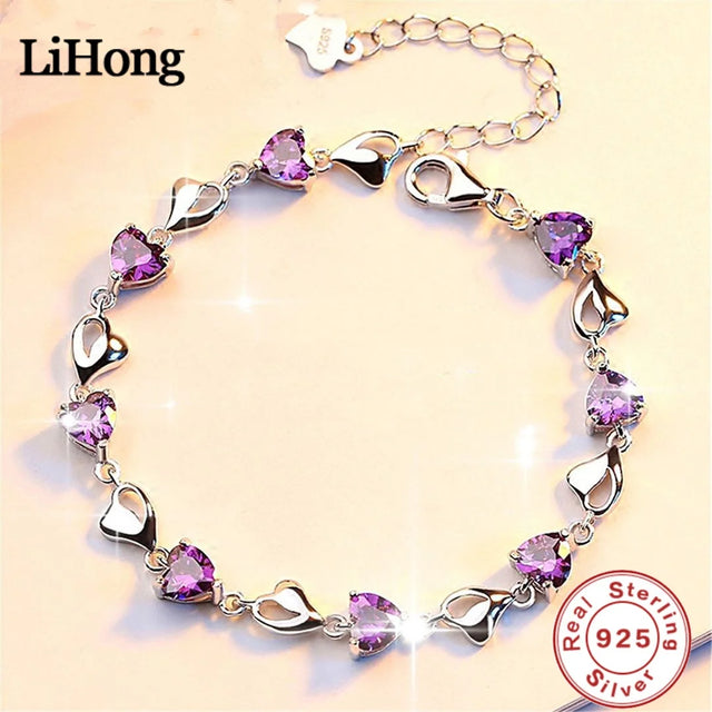 Silver bracelet with purple heart-shaped stones on a beige background, featuring the LiHong brand.