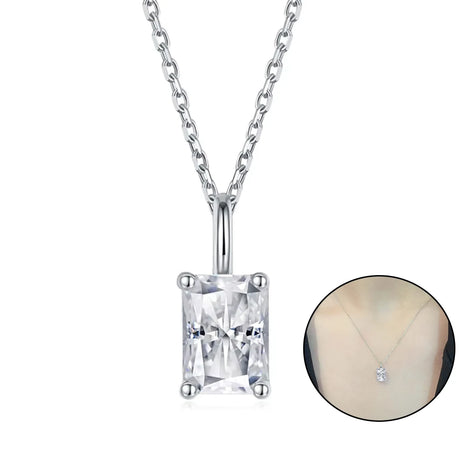 Silver necklace with a diamond pendant on a white background
