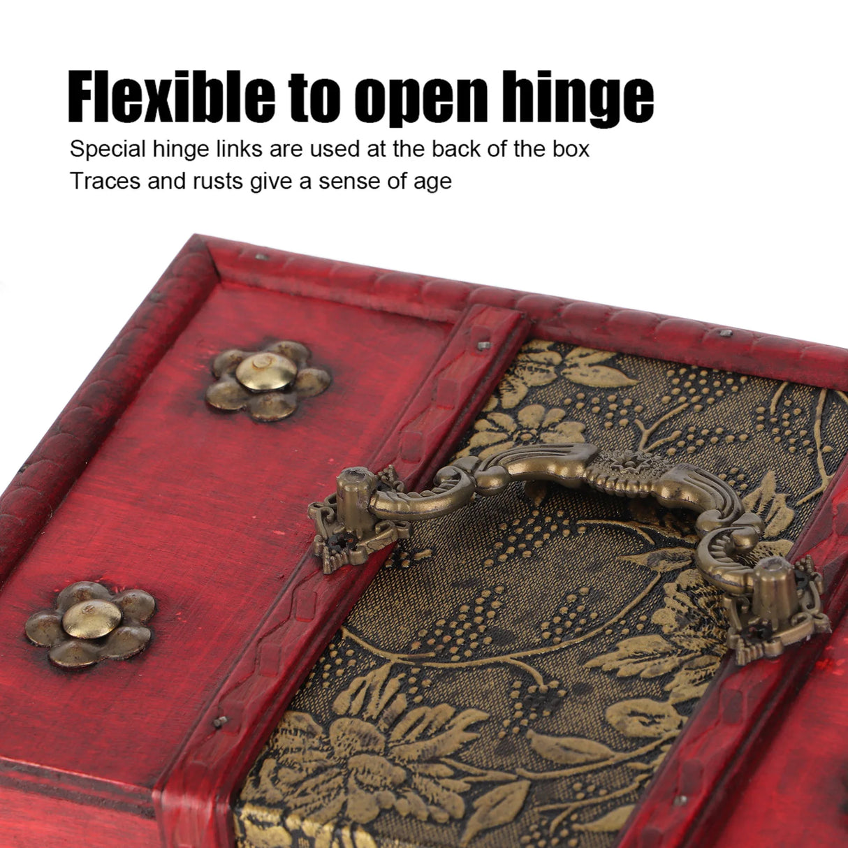 Red box with floral patterns and brass hinges on a white background