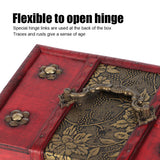 Red box with floral patterns and brass hinges on a white background