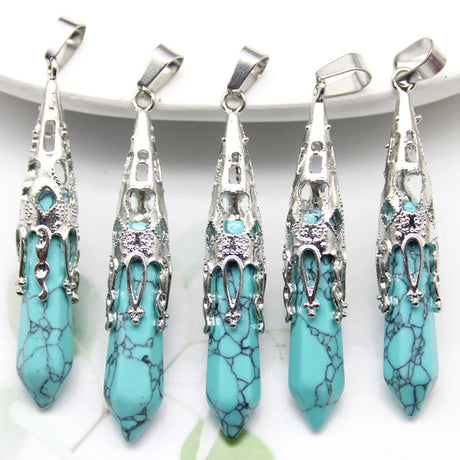 Five turquoise pendant necklaces with silver clasps on a white background