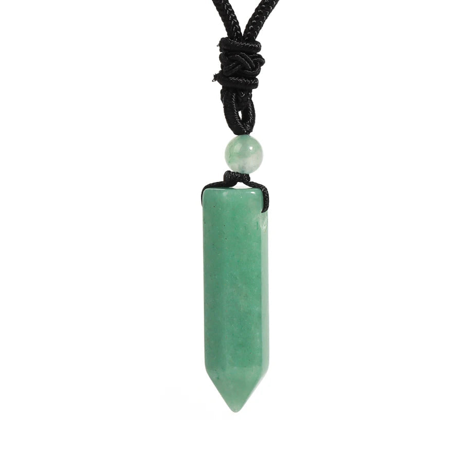 Green crystal pendant necklace on a white background