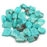 Turquoise stones on a white background