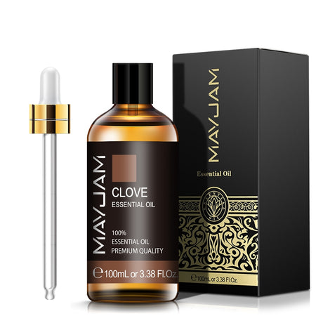 MayJam Clove Essential Oil bottle with dropper and packaging on a white background