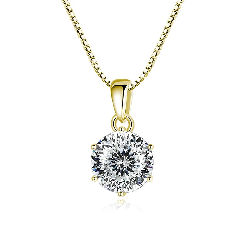 Gold pendant with a large diamond on a white background