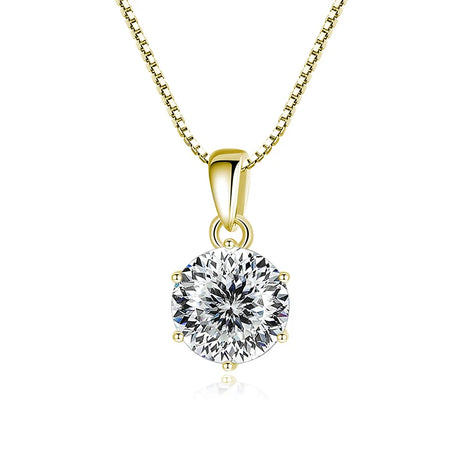 Gold pendant with a large diamond on a white background