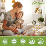 Woman and child in a bedroom with a teddy bear, Pstlalae brand visible