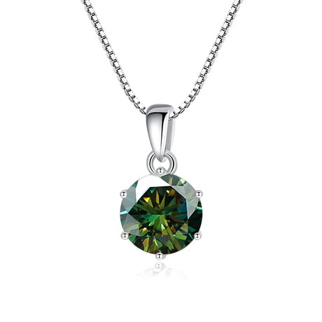 Green gemstone pendant on a silver chain against a white background