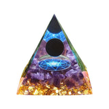 Triangular pyramid with a mystical design on a white background