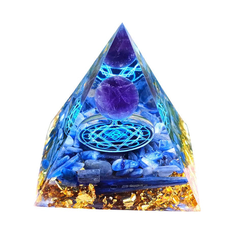 Pyramid-shaped crystal with blue light and purple sphere on a white background