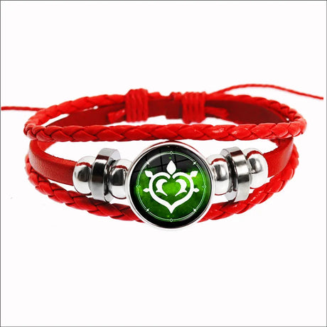 Red braided bracelet with a green and silver emblem on a white background