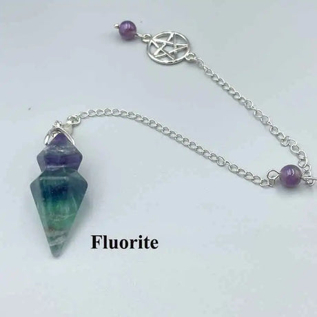 Fluorite crystal pendant on a chain with purple beads against a white background