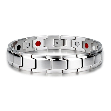Silver bracelet with red and black stones on a white background