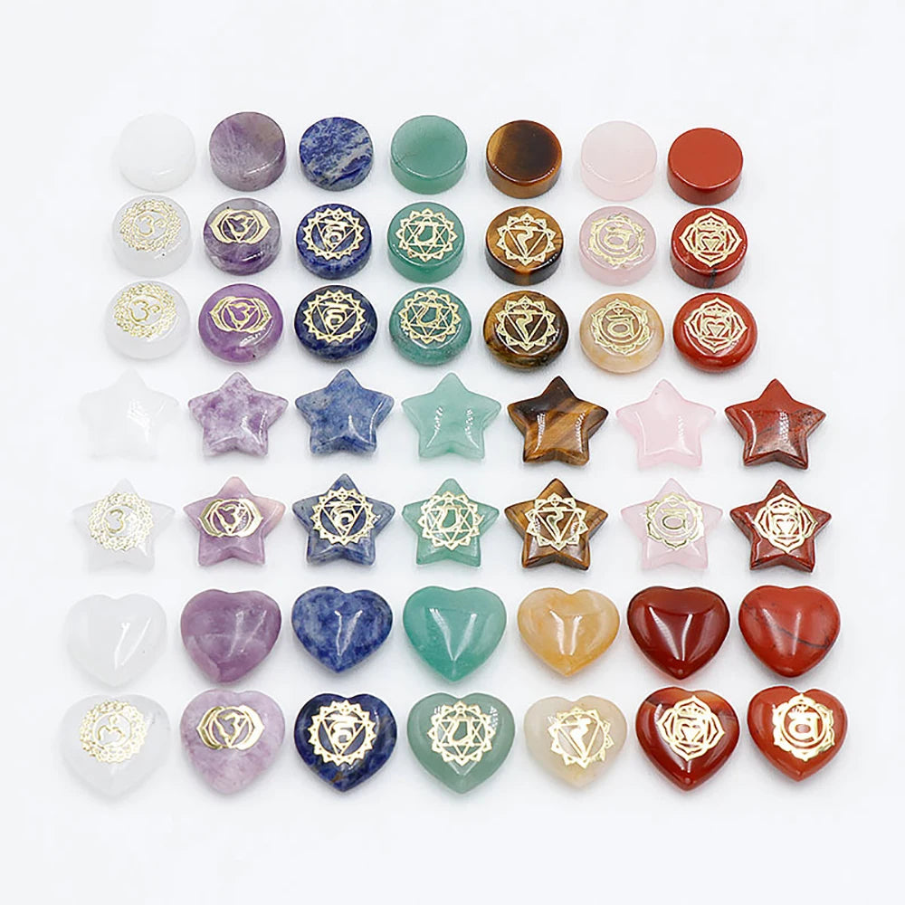Collection of various chakra stones on a white background