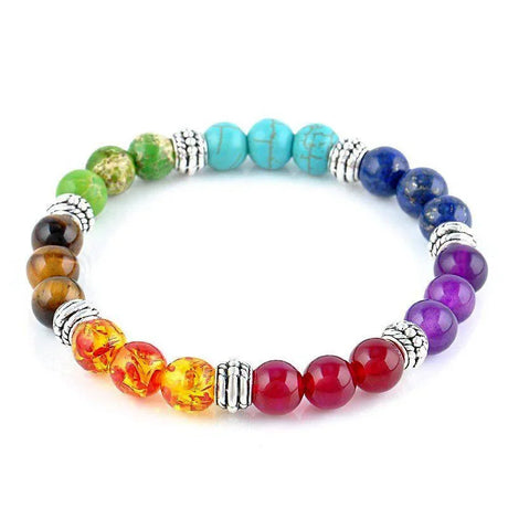 Multicolored beaded bracelet with silver accents on a white background
