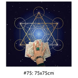 Hand holding tarot cards with a geometric star design and dark blue background