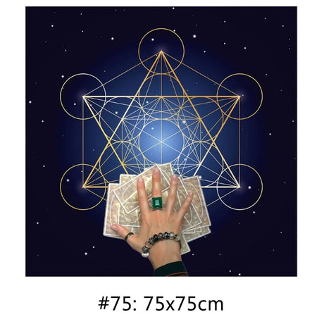 Hand holding tarot cards with a geometric star design and dark blue background