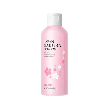 Pink bottle of Japan Sakura body wash on a white background