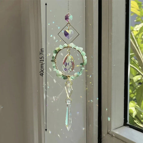 Decorative crystal hanging on a window with measurement label
