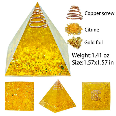 Gold pyramid with copper screw, citrine, and gold foil components on a white background