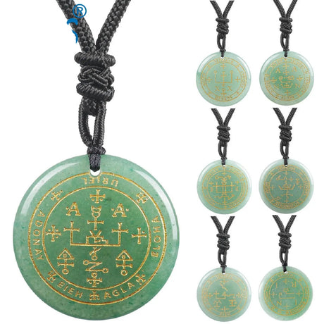 Green pendant necklace with gold symbols on a white background, featuring the brand 'VGDS'.
