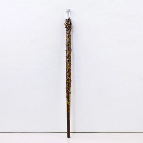 Decorative walking stick with intricate design on a white background