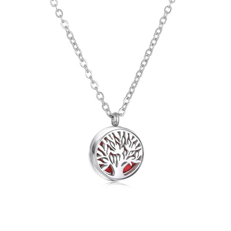 Silver necklace with a tree of life pendant on a white background